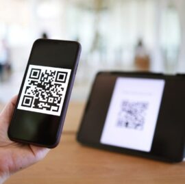 Scanning a VIN-linked QR code to order a replacement car key from AWL Keys